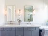 Modern home with Bath Room, Wall Lighting, Engineered Quartz Counter, Porcelain Tile Floor, Ceiling Lighting, Undermount Sink, and Pendant Lighting. 'London Fog' quartz top the vanity pained in Benjamin Moore 'Peppercorn' Photo 8 of Vegas Luxe