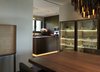 Modern home with Kitchen, Stone Counter, Wood Cabinet, Cooktops, Floor Lighting, Wall Oven, Refrigerator, and Undermount Sink. Kitchen dining Photo 7 of Rock'n Roll