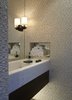 Modern home with Bath Room, Quartzite Counter, Wall Mount Sink, Drop In Tub, One Piece Toilet, Wall Lighting, and Ceiling Lighting. guest toilet Photo 10 of Rock'n Roll