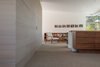 Modern home with Bedroom, Chair, Bookcase, Storage, Dresser, Ceiling Lighting, Carpet Floor, and Recessed Lighting. Master Suite Photo 8 of Oaks Parkhouse