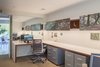 Modern home with Office, Chair, Storage, Bookcase, Desk, Shelves, and Carpet Floor. Office Photo 5 of Oaks Parkhouse