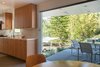 Modern home with Kitchen, Engineered Quartz Counter, Porcelain Tile Floor, Laminate Cabinet, and Undermount Sink. Kitchen Photo 7 of Oaks Parkhouse