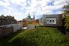 Modern home with Outdoor, Grass, and Back Yard. Door from dwelling unit to mound Photo 8 of Morgan Street Live/Work