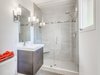 Modern home with Bath Room, Concrete Floor, Two Piece Toilet, Ceramic Tile Wall, and Enclosed Shower. Master Bath Photo 6 of Stunning Eichler Remodel