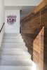 Modern home with Concrete Floor, Staircase, Concrete Tread, and Wood Railing. The Charm Townhouse - Entrance Hall Photo 3 of The Charm Townhouse