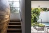 Modern home with Wood Tread, Wood Railing, Metal, Outdoor, Back Yard, Trees, Shrubs, Gardens, Swimming Pools, Tubs, Shower, Garden, and Small Pools, Tubs, Shower. The Charm Townhouse - Going down to the basement floor Photo 20 of The Charm Townhouse