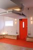 Modern home with Living Room, Bench, Wall Lighting, Storage, Ceiling Lighting, Plywood Floor, and Carpet Floor. Folding entry wall (up) Photo 4 of Facade/Fasad