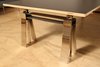 Modern home with Living Room, Plywood Floor, and Coffee Tables. Custom multi-mode table (close-up of adjustable support) Photo 15 of Facade/Fasad