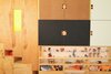 Modern home with Storage Room, Cabinet Storage Type, Shelves Storage Type, and Under Stairs Storage Type. Close-up step-storage and moving divider panel with storage and usable surfaces Photo 4 of LO Residence Playroom/Bedroom