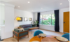 Modern home with Living Room, Sofa, Lamps, Table, Chair, Coffee Tables, Floor Lighting, Ceiling Lighting, Recessed Lighting, and Light Hardwood Floor. Living Room Photo 2 of East Pender home