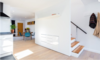 Modern home with Storage Room and Under Stairs Storage Type. Kitchen/Stairwell Photo 6 of East Pender home