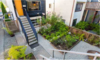 Modern home with Outdoor, Front Yard, Flowers, Raised Planters, Gardens, Vegetables, Horizontal Fences, Wall, Planters Patio, Porch, Deck, Walkways, Wood Fences, Wall, Metal Fences, Wall, and Decomposed Granite Patio, Porch, Deck. Garden Photo 13 of East Pender home