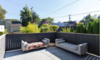 Modern home with Outdoor, Large Patio, Porch, Deck, Horizontal Fences, Wall, Wood Fences, Wall, and Rooftop. Back Deck Photo 14 of East Pender home