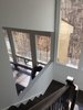 Modern home with Staircase, Wood Railing, Metal Railing, and Wood Tread. Stairway Photo 9 of House in the Trees