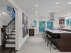 Kitchen and stairs Photo 2 of House in the Trees modern home