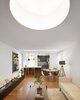 Modern home with Living Room, Bench, Chair, Coffee Tables, Sofa, Console Tables, Ottomans, Pendant Lighting, Ceiling Lighting, and Medium Hardwood Floor. Interior Photo 5 of Casa Plaza