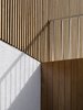 Modern home with Outdoor, Vertical Fences, Wall, Wood Patio, Porch, Deck, Wood Fences, Wall, Concrete Patio, Porch, Deck, and Front Yard. Detail Photo 3 of Casa Plaza