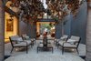Modern home with Outdoor, Large Patio, Porch, Deck, Trees, Tile Patio, Porch, Deck, Pavers Patio, Porch, Deck, and Stone Patio, Porch, Deck. Zen Courtyard with Magnolia Trees Photo 3 of The OneTaste Residence