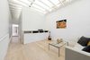Modern home with Living Room, Ceiling Lighting, Coffee Tables, Sofa, Light Hardwood Floor, and Recessed Lighting. Front room Photo 2 of Curtain Cottage