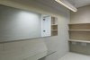 Modern home with Bath Room, Tile Counter, Pendant Lighting, and Porcelain Tile Wall. Bathroom detail Photo 6 of Curtain Cottage