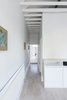 Modern home with Hallway and Light Hardwood Floor. Corridor (Day) Photo 9 of Curtain Cottage