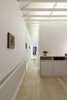 Modern home with Light Hardwood Floor, Ceiling Lighting, Recessed Lighting, Console Tables, and Living Room. Corridor (Night) Photo 10 of Curtain Cottage