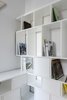 Modern home with Storage Room, Shelves Storage Type, and Cabinet Storage Type. Cabinetry detail Photo 13 of Curtain Cottage