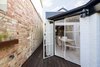 Modern home with Back Yard, Hardscapes, Small Patio, Porch, Deck, Wood Patio, Porch, Deck, Decking Patio, Porch, Deck, Planters Patio, Porch, Deck, Doors, Metal, Exterior, and Swing Door Type. Courtyard (Day) Photo 17 of Curtain Cottage