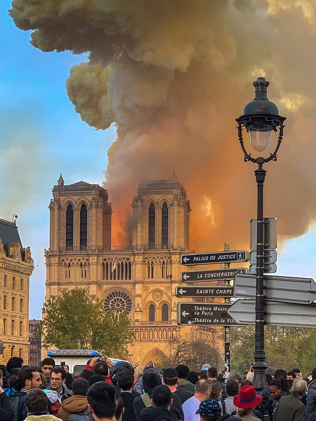 Crowds gathered as flames consumed one of Paris' most historic landmarks.