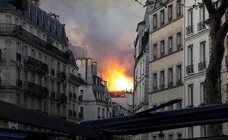 Flames were visible throughout Paris.