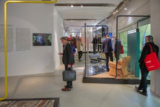 Visitors interacting with the clusters in the exhibition.
