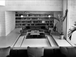 Rudolph created distinct areas in the home for residents to go according to their mood. The two-story window in the living room contrasts with other areas of the home which feel more secluded. 