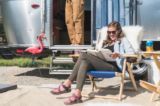 These original Don Featherstone Pink Flamingos add a nostalgic touch to a modern campsite.