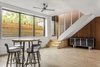Modern home with Cork Floor, Coffee Tables, Stools, Ceiling Lighting, Chair, Staircase, Wood Tread, and Metal Railing. The basement was designed to enjoy natural light. Photo 4 of Copperwood
