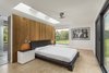 Modern home with Bedroom, Bed, Night Stands, Ceiling Lighting, Recessed Lighting, Cork Floor, and Cement Tile Floor. The bedroom features a floating wall, with beautiful views on three sides. Photo 6 of Copperwood
