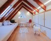 Modern home with Bedroom, Bed, Dresser, Medium Hardwood Floor, Storage, and Wall Lighting. Refugee bed room, able to host up tu four person Photo 4 of From intimicy to social: a weekend apartment in the mountains
