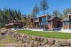 Modern home with Outdoor, Trees, Front Yard, Hardscapes, Gardens, Boulders, Walkways, Raised Planters, Concrete Patio, Porch, Deck, Decking Patio, Porch, Deck, Stone Patio, Porch, Deck, Wood Patio, Porch, Deck, Large Patio, Porch, Deck, Horizontal Fences, Wall, and Metal Fences, Wall. Exterior Photo 7 of Timberidge
