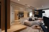 Modern home with Living Room, Sofa, Marble Floor, Ceiling Lighting, and Rug Floor. The expansive glass window extending to the floor brings sunlight into the home, and the light passing through the glass and line of sight passing through the window give the living room as a whole a sense of spaciousness and ease.
Photo 3 of During the strolling