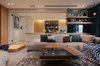 Modern home with Living Room, Sofa, Ceiling Lighting, Marble Floor, and Rug Floor. The living room is both public space, and also a leisure area where one can enjoy sensory pleasures. A large hidden projector screen is located above the marble wall, and can be pulled down to achieve the maximum possible audiovisual effect.
Photo 4 of During the strolling