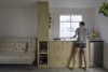 Modern home with Concrete Floor, Refrigerator, Living Room, Wood Counter, Wood Cabinet, and Sofa. Kitchen / living Photo 3 of Narvarte Terrace