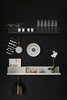 Modern home with Storage Room and Shelves Storage Type. The Folded shelves by Johan Van Hengel for Muuto were inspired by the show-play of layers, two of these versatile wall mounts in black and grey paired against the solid black back-wall in kitchen. The magazine fold holds an equally interesting cookbook to try out, ‘The Designer’s Cookbook’ indexing recipes by colours. The award winning broom & funnel dustpan by Polish designer Jan Kochanski for Menu Design is so simple in it’s core idea, an object you would enjoy using as well as being a part of the decor. Balancing the composition is a black and white Siirtolapuutarha ceramic plate from Marimekko at the center of the wall. Photo 13 of Living in Monochrome, far away from Nordic lands