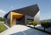 Modern home with Exterior, Wood Siding Material, Brick Siding Material, House Building Type, Stone Siding Material, and Gable RoofLine. Entrance zone Photo 17 of BLACK ROCK