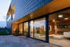 Modern home with Exterior, Tile Roof Material, Gable RoofLine, Stucco Siding Material, House Building Type, Stone Siding Material, and Wood Siding Material. Terrace Photo 9 of BLACK ROCK