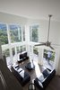 Modern home with Living Room, Sofa, Ottomans, Ceiling Lighting, Sectional, Table Lighting, Wall Lighting, Floor Lighting, Track Lighting, and Medium Hardwood Floor. The Angle House Photo 9 of The Angle House
