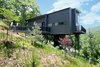 Modern home with Outdoor, Back Yard, Shrubs, Trees, Grass, and Large Patio, Porch, Deck. The Angle House Photo 12 of The Angle House