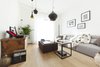 Modern home with Living Room, Pendant Lighting, and Light Hardwood Floor. living room Photo 3 of Iterior DM