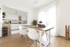 Modern home with Dining Room, Light Hardwood Floor, Pendant Lighting, and Table. kitchen Photo 6 of Iterior DM