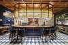 Modern home with Dining Room, Bar, Ceiling Lighting, Recessed Lighting, and Wall Lighting. The street level of the hotel is home to Osteria Marzia, a coastal Italian eatery and bar run by Black Sheep Restaurants. Just like the hotel, the restaurant embraces a maritime concept. Photo 5 of The Fleming Hotel
