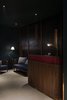 Modern home with Office, Study Room Type, Library Room Type, Chair, and Lamps. On the first floor is the reception and lobby area with red key cubbies inspired by local post office boxes, and a nautical-inspired seating area for lounging. Photo 10 of The Fleming Hotel