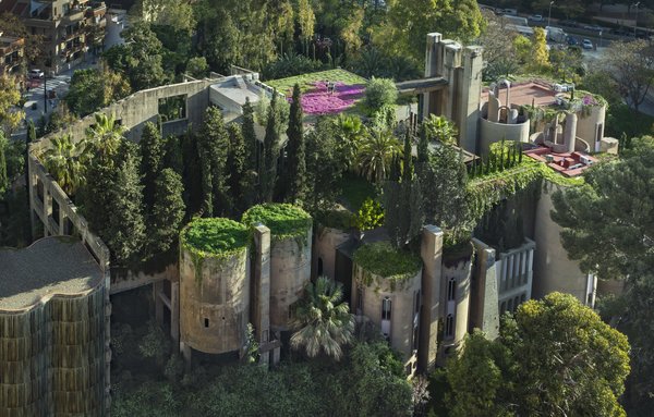 Starting in 1975, Bofill began transforming an abandoned 1920s Sansón Cement Factory, located five miles outside Barcelona in the village of Sant Just Desvern, into his home and the headquarters for his firm, Ricardo Bofill Taller de Arquitectura. Bofill described the renovation as sculpting it "like a work of art," and the project is ever-ongoing: the complex is over 300,000 square feet, and consists of over 30 silos that had been full of concrete.